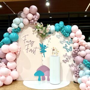 Stunning backdrop setup for instagram photos for a kids 1st birthday party in snohomish county & king county. Featuring a custom fairy prop / butterfly props, custom cake stand, backdrop arch, arched floor mat, custom vinyl signage, and balloon garlands from bradbury events.