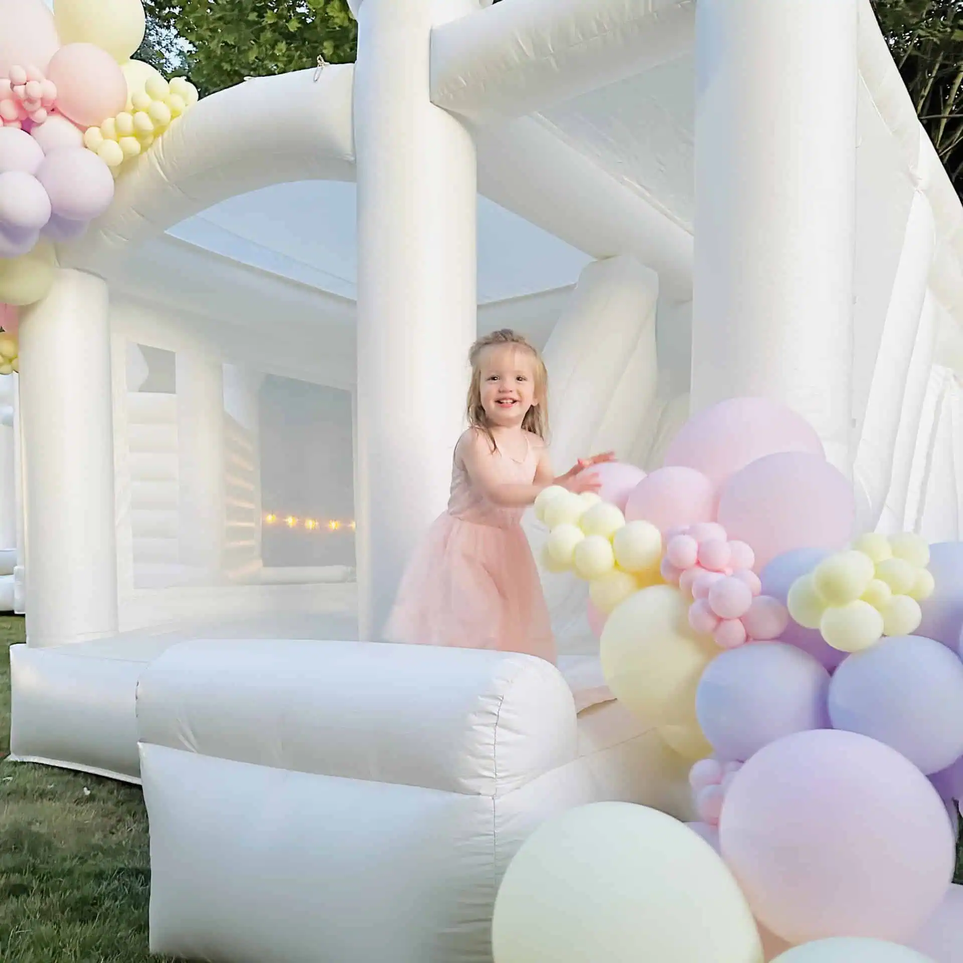 St. Helens combo bouncer - luxury white bounce house for upscale events. Kids bouncing on bounce house for birthday party on our Luxury bounce house rental in Edmonds & white bounce castle in edmonds in Snohomish county and king county.