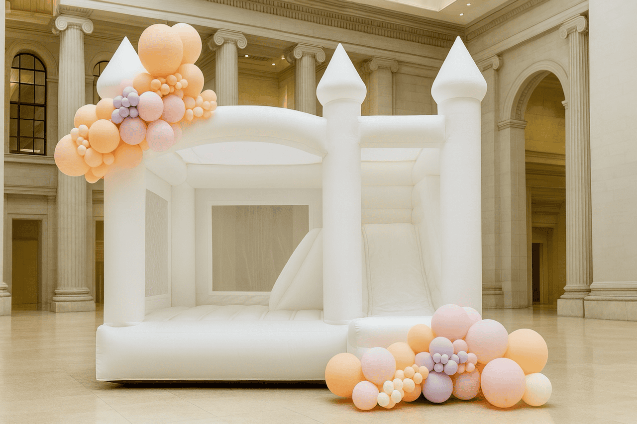 Indoor Bounce House Rental with balloon garland in hotel ballroom for indoor party in snohomish county and king county.