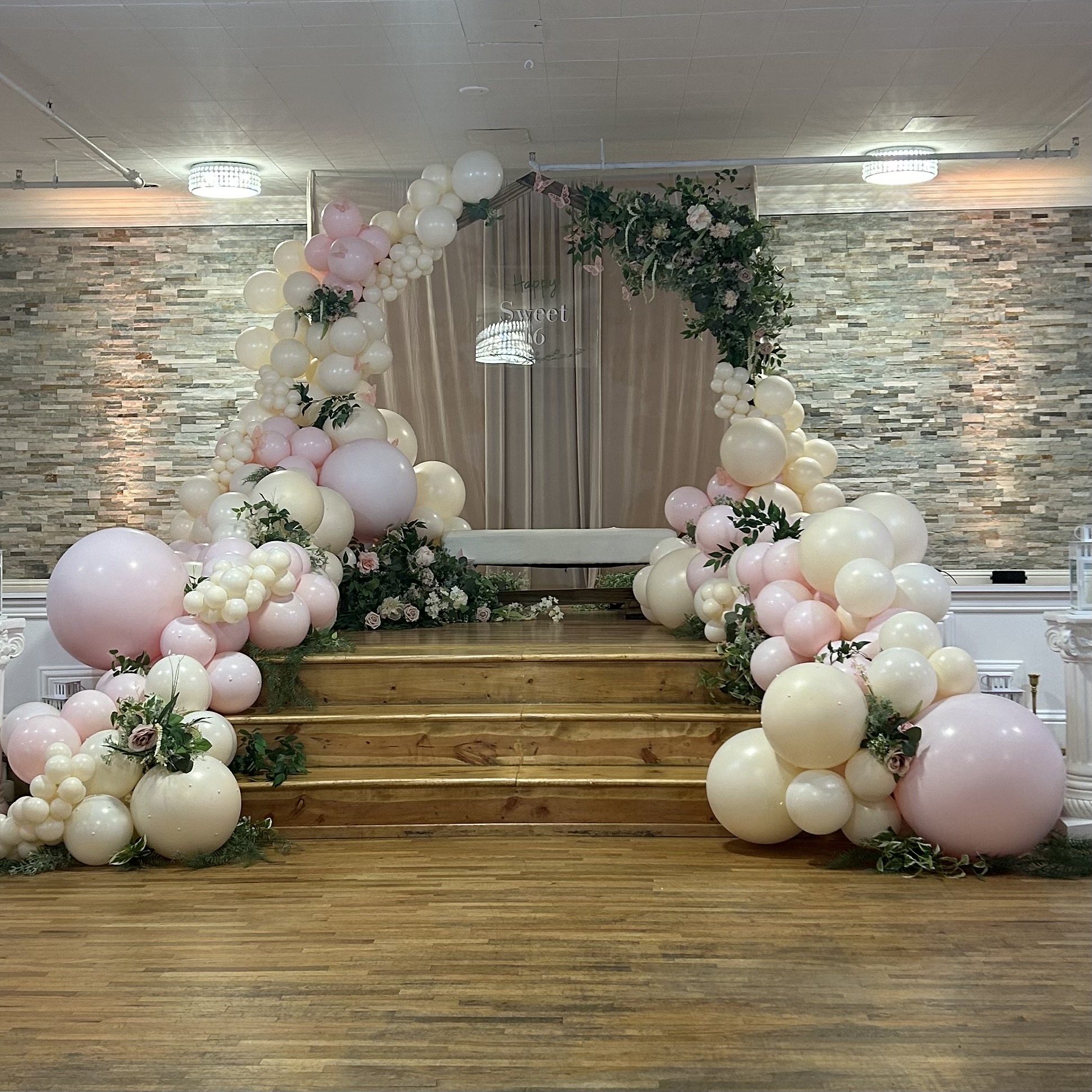 Blush, ivory, and sage balloon garland and custom backdrop for a Sweet 16 at Song River in Monroe, WA